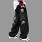 Boys Street Style Jeans. Svarta raka jeans med cartoon-tryck baktill