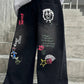 Boys Street Style Jeans. Svarta raka jeans med cartoon-tryck baktill