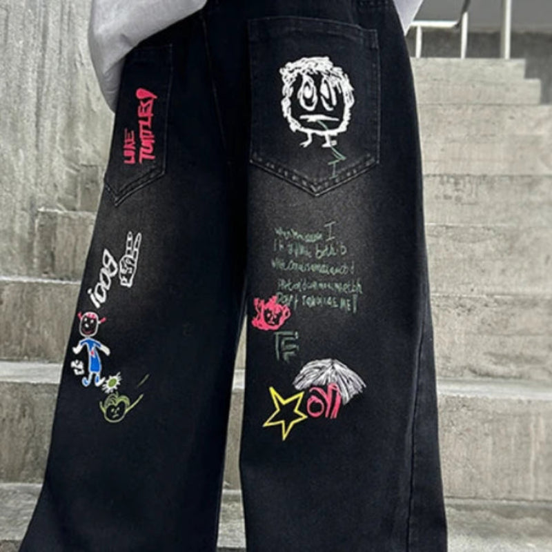 Boys Street Style Jeans. Svarta raka jeans med cartoon-tryck baktill