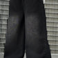 Boys Street Style Jeans. Svarta raka jeans med cartoon-tryck baktill