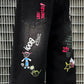 Boys Street Style Jeans. Svarta raka jeans med cartoon-tryck baktill