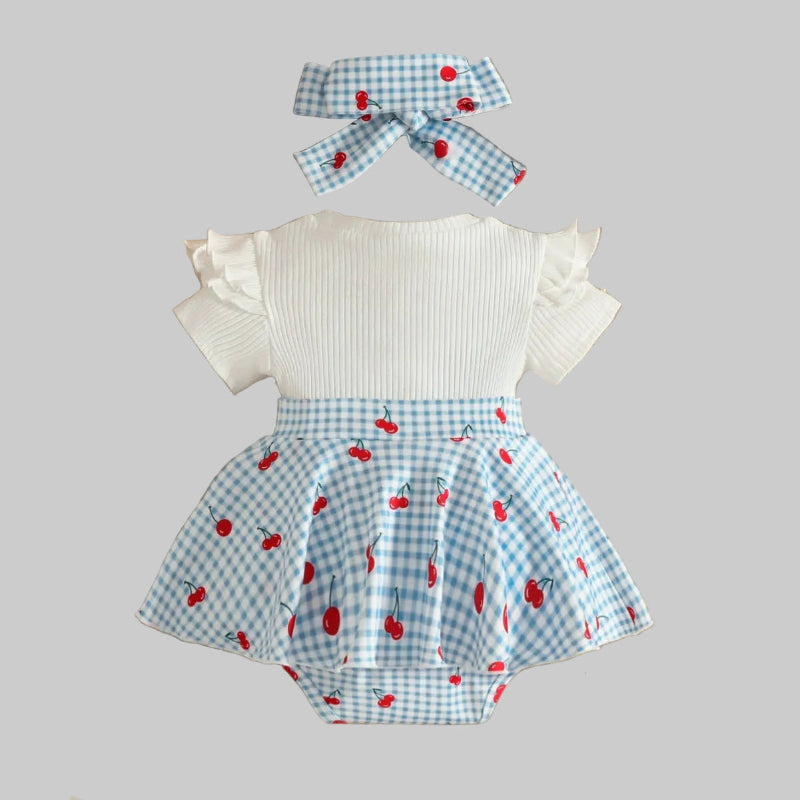 Ge garderoben en extra söt sommarkänsla med denna baby flicka romperklänning från Pudcoco.